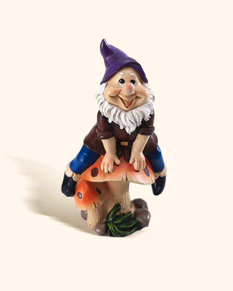 Joyful Gnome Sitting on a Mushroom Garden Statue